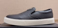 Prada Triangle-Patch Slip-On Shoes